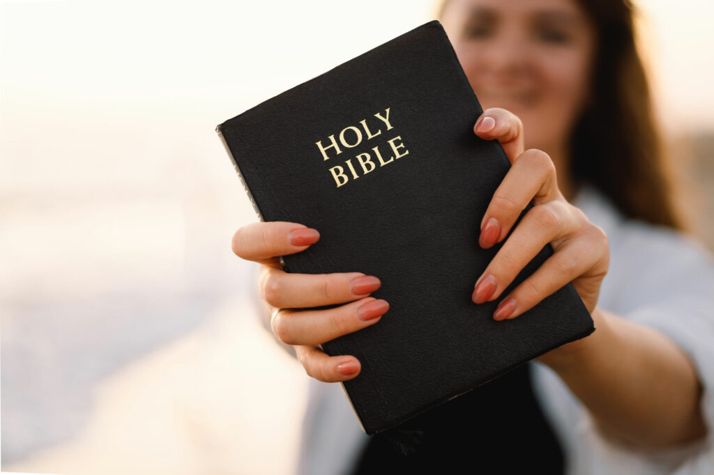 woman holding bible